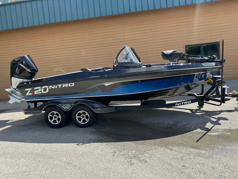 The Image of 2024 Nitro ZV20 Pro fishing boat on trailer, parked outdoors. - 0