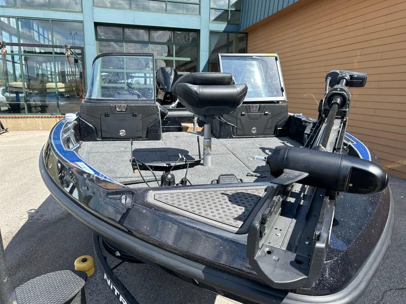 Slide: The Image of 2024 Nitro ZV20 Pro fishing boat with advanced equipment, displayed outdoors. - 1