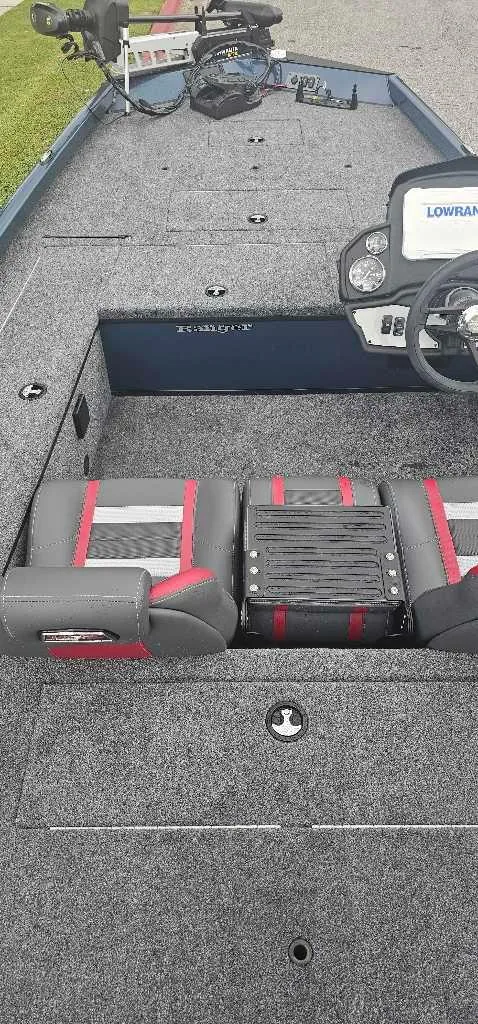 Slide: The Image of 2024 Ranger RT178C boat interior with steering wheel and seating. - 3
