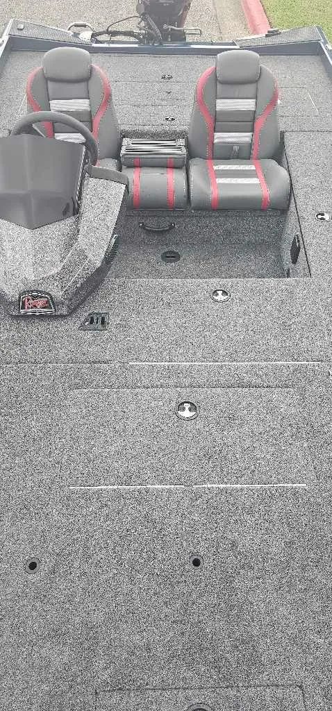 Slide: The Image of 2024 Ranger RT178C boat interior with dual seats and steering console. - 4