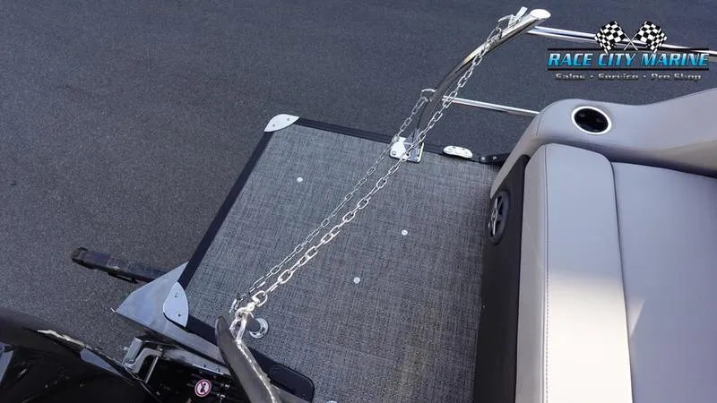 Slide: The Image of Barletta Cabrio 22U 2025 boat deck with chain and seating, Race City Marine logo. - 10