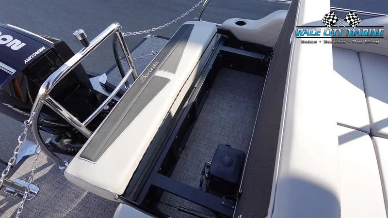 Slide: The Image of 2025 Barletta Cabrio 22U boat interior with seating and storage area. - 11