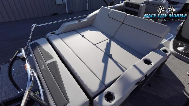 Slide: The Image of 2025 Barletta Cabrio 22U boat interior with spacious seating and cup holders. - 13