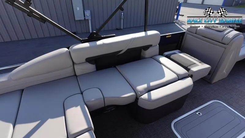 Slide: The Image of 2025 Barletta Cabrio 22U boat interior with plush seating and modern design. - 19