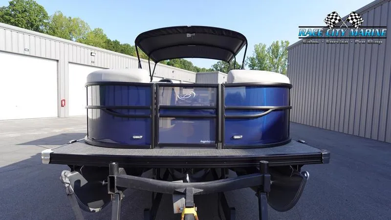 Slide: The Image of 2025 Barletta Cabrio 22U pontoon boat on trailer at Race City Marine. - 2