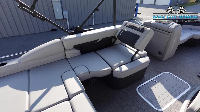 Slide: The Image of 2025 Barletta Cabrio 22U pontoon boat interior with plush seating and modern design. - 20