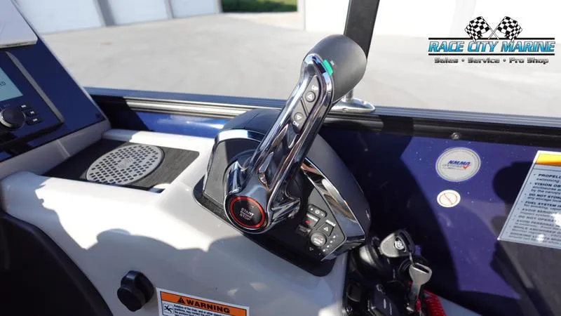 Slide: The Image of 2025 Barletta Cabrio 22U boat throttle control in cockpit, Race City Marine branding. - 24