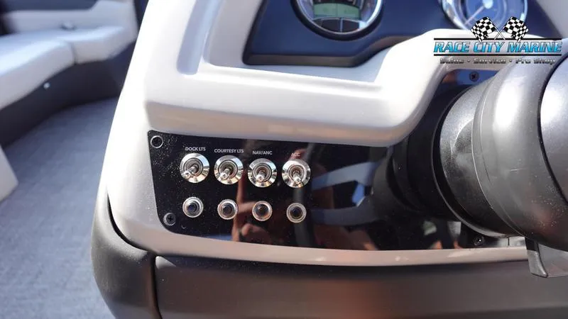 Slide: The Image of Control panel of 2025 Barletta Cabrio 22U boat with switches and gauges. - 25