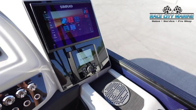 Slide: The Image of 2025 Barletta Cabrio 22U dashboard with Simrad display at Race City Marine. - 28