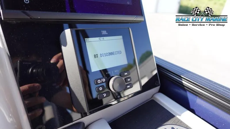 Slide: The Image of 2025 Barletta Cabrio 22U boat dashboard with JBL Bluetooth display showing "BT DISCONNECTED". - 29