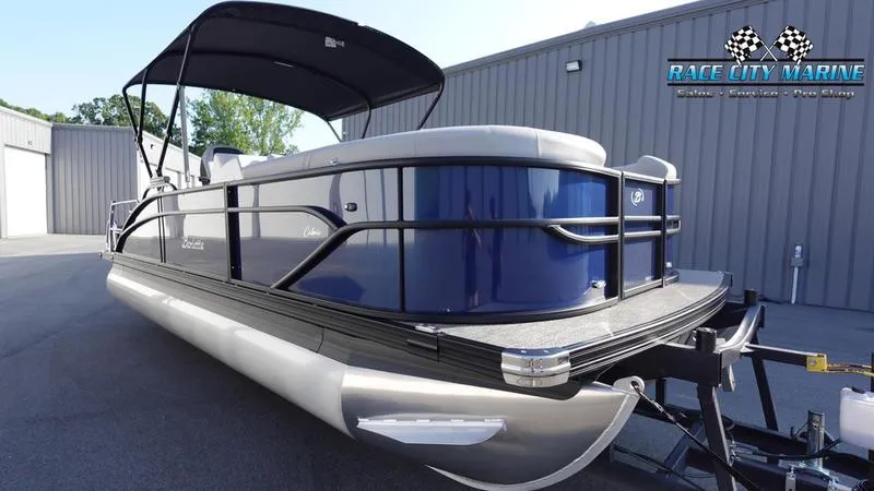 Slide: The Image of 2025 Barletta Cabrio 22U pontoon boat at Race City Marine dealership. - 3