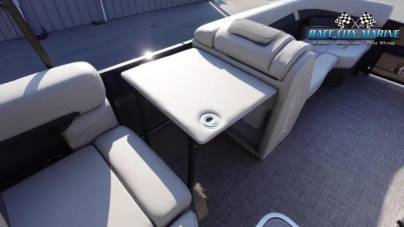 Slide: The Image of 2025 Barletta Cabrio 22U boat interior with seating and table. - 32