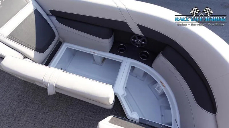 Slide: The Image of 2025 Barletta Cabrio 22U boat interior with open storage compartments. - 42