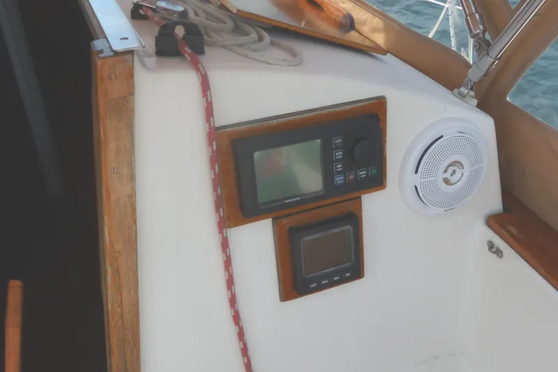 Slide: The Image of Control panel and speaker on 1981 Sabre 34 sailboat cockpit. - 11