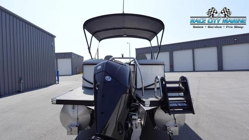 Slide: The Image of 2025 Barletta C24QC pontoon boat with canopy at Race City Marine. - 5