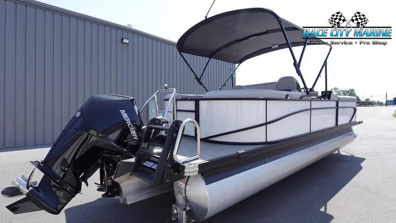 Slide: The Image of 2025 Barletta C24QC pontoon boat with Mercury outboard motor at Race City Marine. - 6