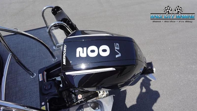 Slide: The Image of 2025 Barletta C24QC with Mercury 200 V6 outboard engine, Race City Marine logo. - 9