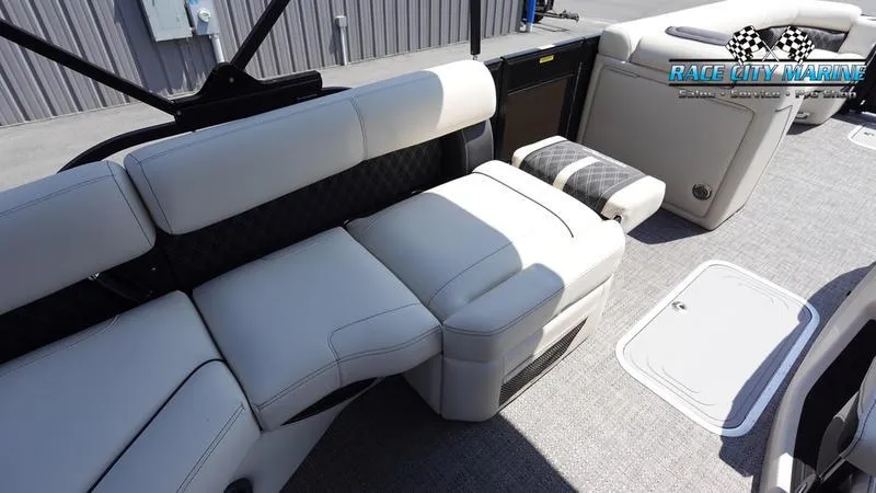 Slide: The Image of 2025 Barletta L25M boat interior with plush seating and modern design. - 17