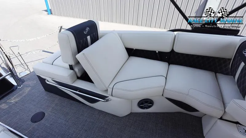 Slide: The Image of 2025 Barletta L25M boat interior with white leather seating and modern design. - 19