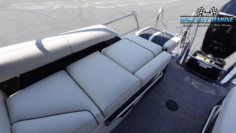 Slide: The Image of 2025 Barletta L25M boat interior with plush seating and modern design. - 24