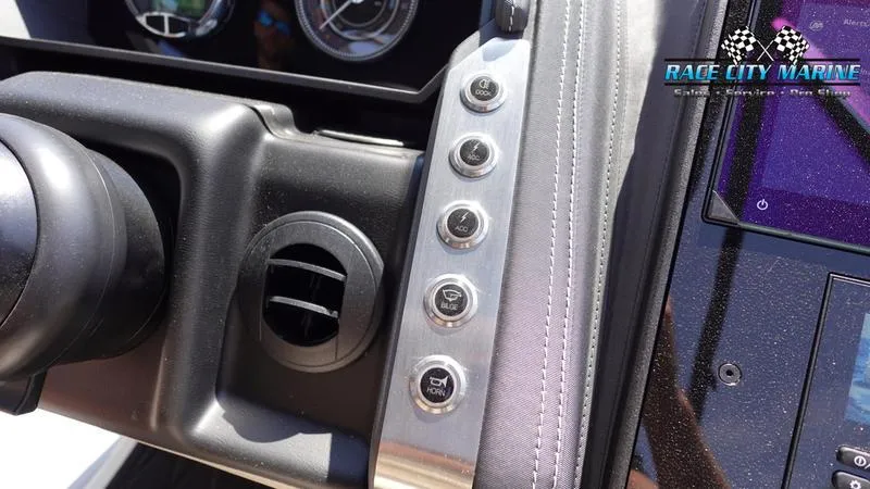Slide: The Image of Dashboard controls of 2025 Barletta L25M boat with Race City Marine branding. - 31