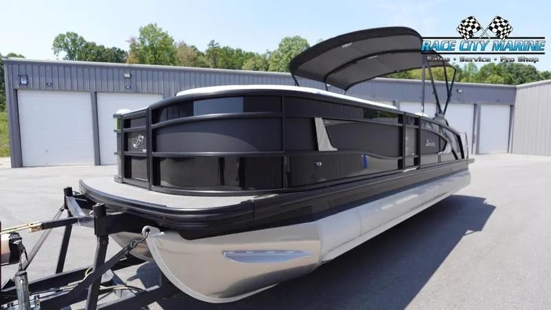 Slide: The Image of 2025 Barletta L25M pontoon boat at Race City Marine dealership. - 4
