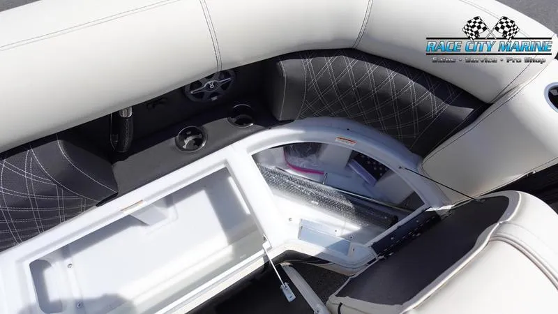 Slide: The Image of Interior view of 2025 Barletta L25M boat with open storage compartment. - 47