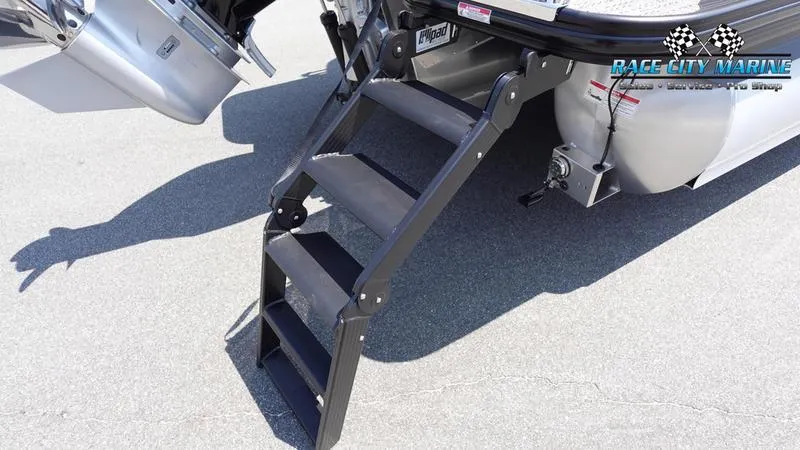 Slide: The Image of 2025 Barletta L25M boat with foldable boarding ladder on pavement. - 8