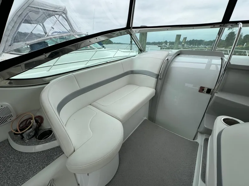Slide: The Image of 2007 Formula 40 PC yacht interior with white seating and panoramic windows. - 13