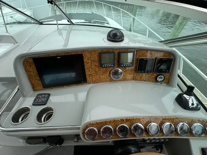 Slide: The Image of Control panel of a 2007 Formula 40 PC yacht with navigation instruments and gauges. - 16