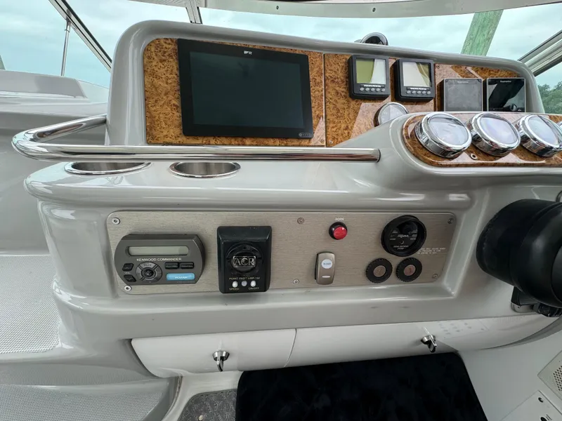 Slide: The Image of Control panel of a 2007 Formula 40 PC boat with navigation instruments. - 18