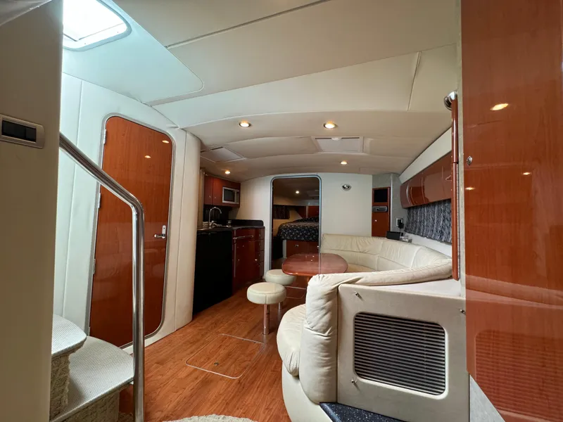 Slide: The Image of 2007 Formula 40 PC yacht interior with modern kitchen and seating area. - 23