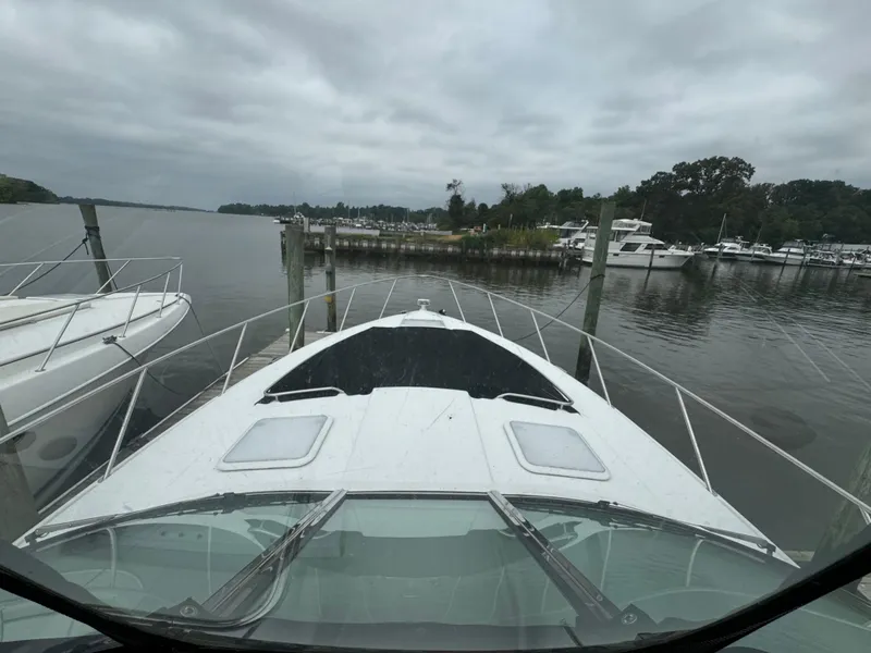 Slide: The Image of 2007 Formula 40 PC yacht docked at a marina on a cloudy day. - 5