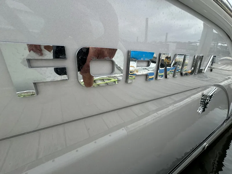 Slide: The Image of 2007 Formula 40 PC boat with reflective chrome lettering on the side. - 6