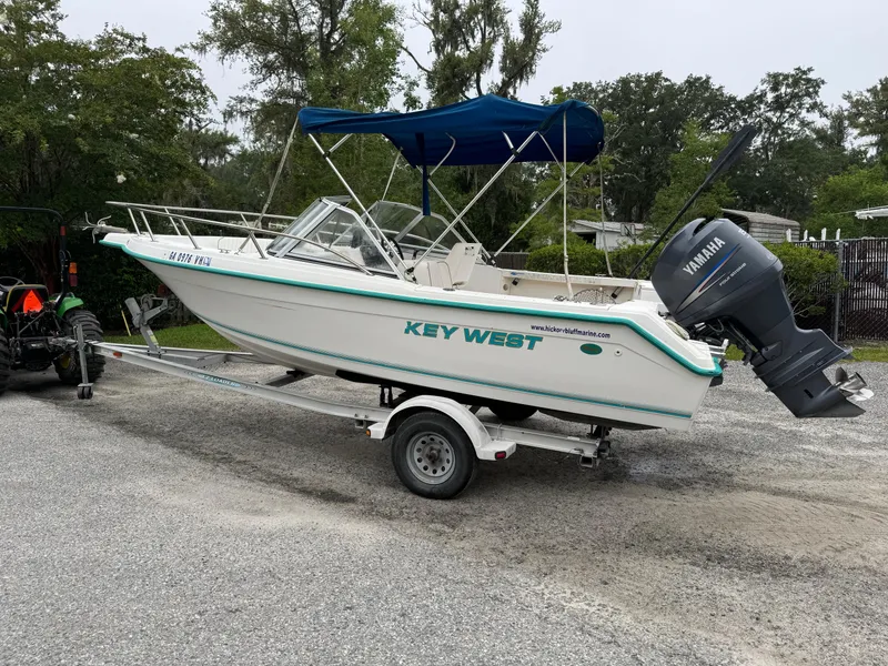 Slide: The Image of Key West 1900 Dual Console boat on trailer with Yamaha outboard motor, 2000 model. - 2