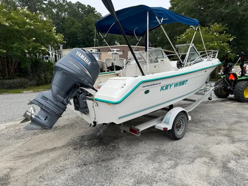 Slide: The Image of Key West 1900 Dual Console boat, 2000 model, on trailer with Yamaha outboard motor. - 3