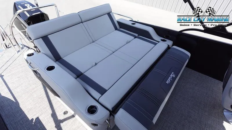 Slide: The Image of 2025 Barletta X23UC boat with spacious seating and modern design. - 13