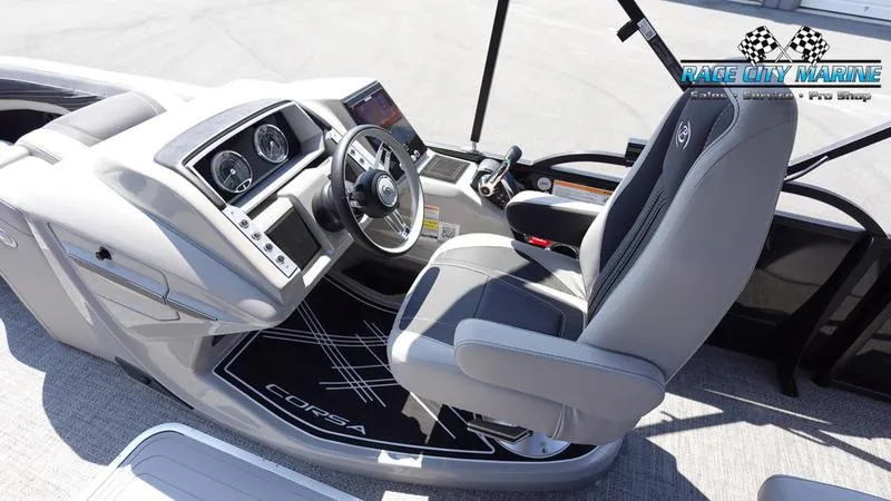 Slide: The Image of 2025 Barletta X23UC boat cockpit with modern steering and controls. - 18