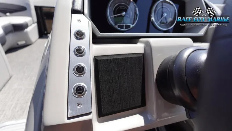 Slide: The Image of Barletta X23UC 2025 dashboard with control buttons and steering wheel, Race City Marine branding. - 26