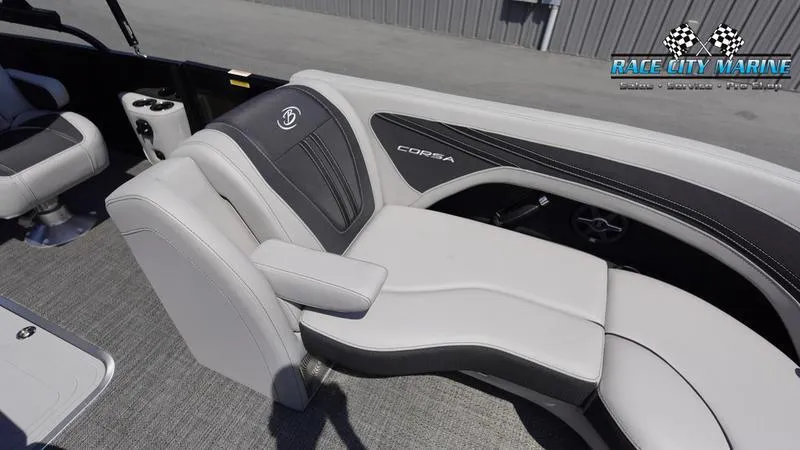 Slide: The Image of 2025 Barletta X23UC boat interior with gray seating and Race City Marine logo. - 38