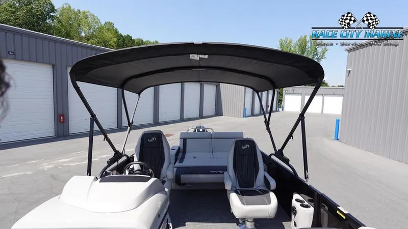 Slide: The Image of 2025 Barletta X23UC pontoon boat interior with canopy at Race City Marine. - 43