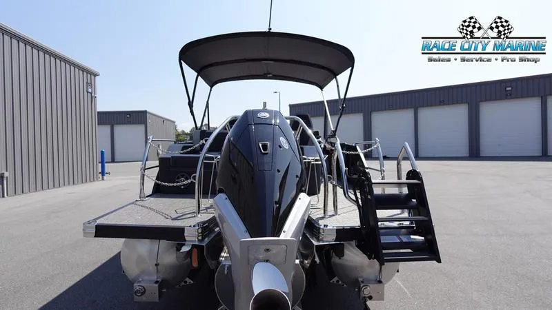 Slide: The Image of 2025 Barletta X23UC pontoon boat at Race City Marine dealership. - 5
