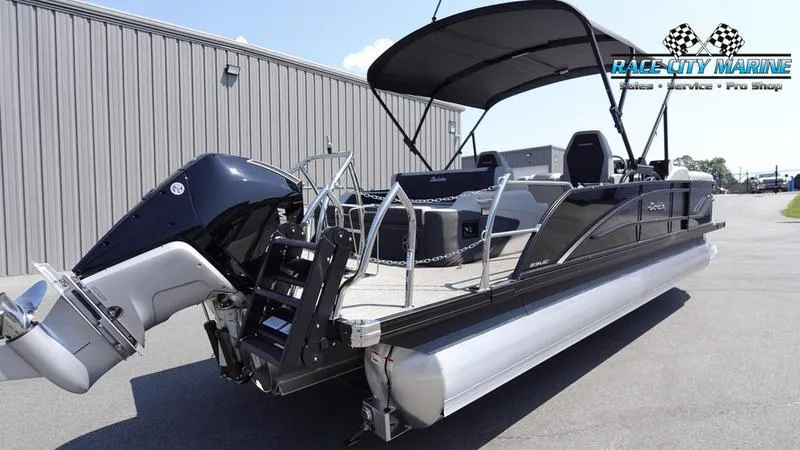 Slide: The Image of 2025 Barletta X23UC pontoon boat with canopy, displayed at Race City Marine. - 6