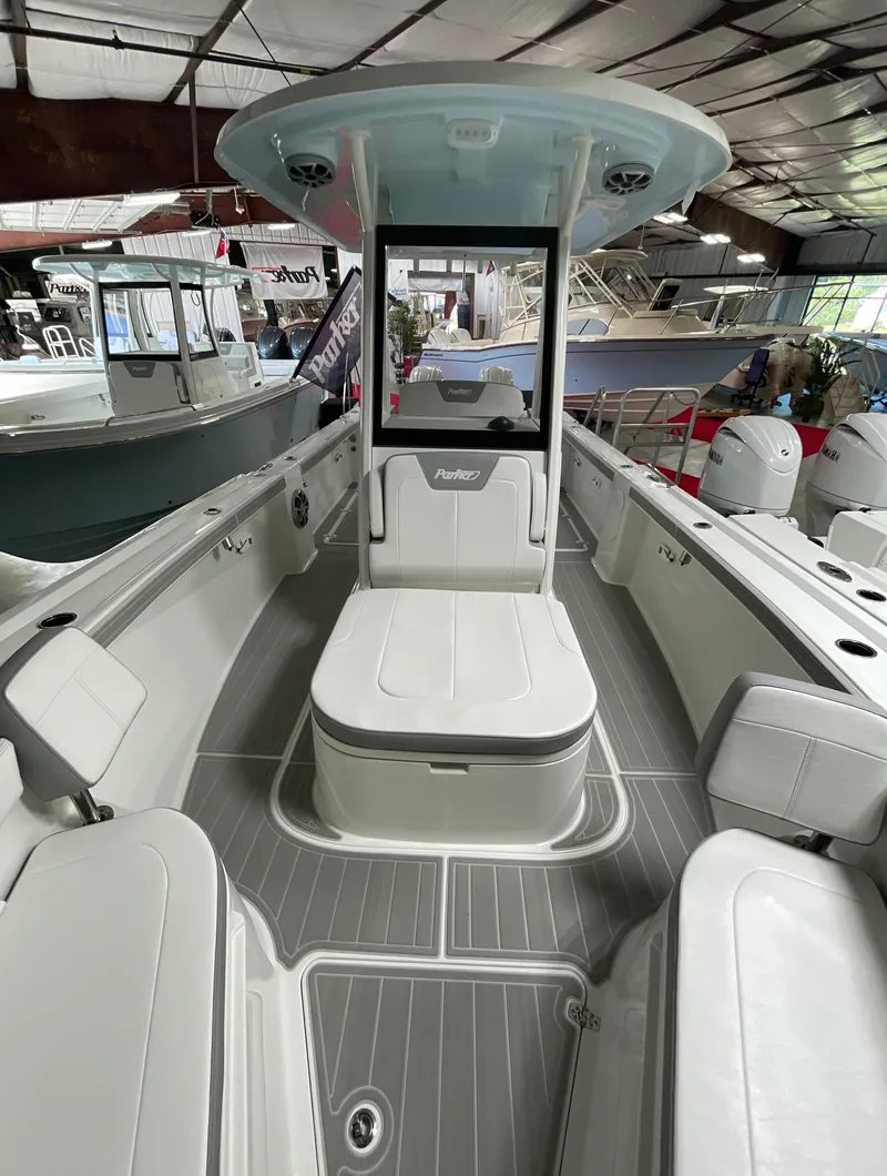 Slide: The Image of 2025 Parker 2600 Center Console boat interior, showcasing sleek design and spacious seating. - 4