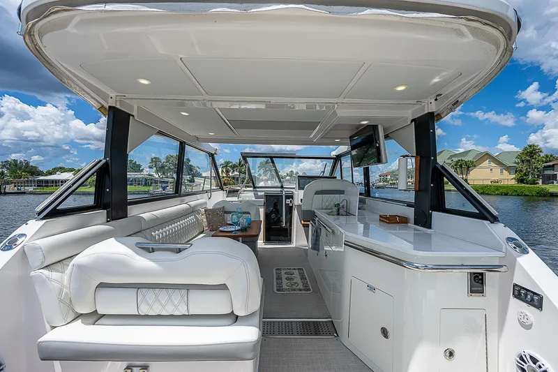 Slide: The Image of Luxurious 2022 Regal 36 XO yacht interior with spacious seating and modern amenities. - 2