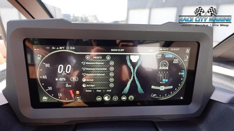 Slide: The Image of Dashboard display of 2023 Malibu 26 LSV boat with digital controls and settings. - 30