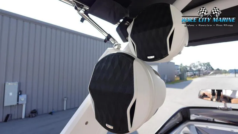 Slide: The Image of 2023 Malibu 26 LSV boat speakers at Race City Marine dealership. - 38