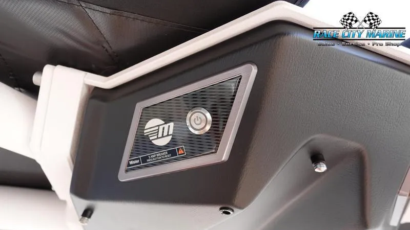Slide: The Image of 2023 Malibu 26 LSV boat control panel with Race City Marine logo. - 39