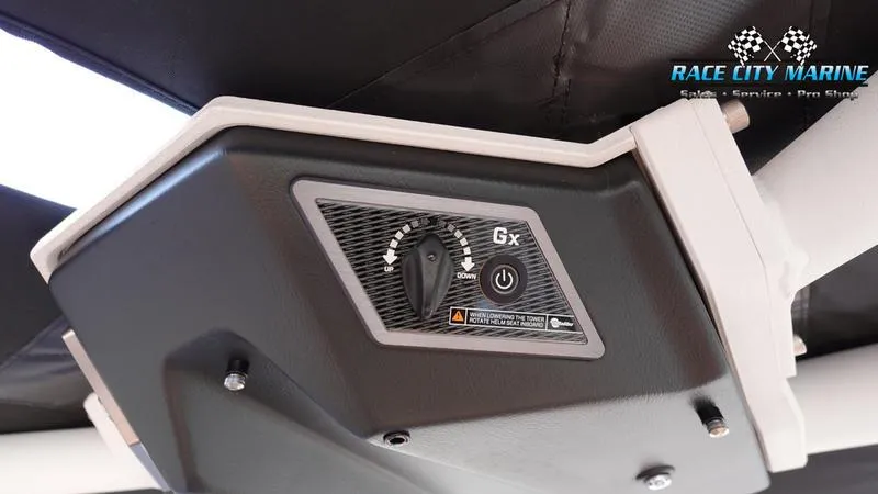 Slide: The Image of 2023 Malibu 26 LSV boat control panel with Race City Marine branding. - 40