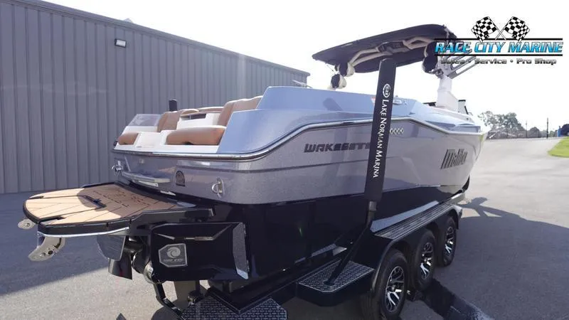 Slide: The Image of 2023 Malibu 26 LSV boat on trailer at Race City Marine. - 7